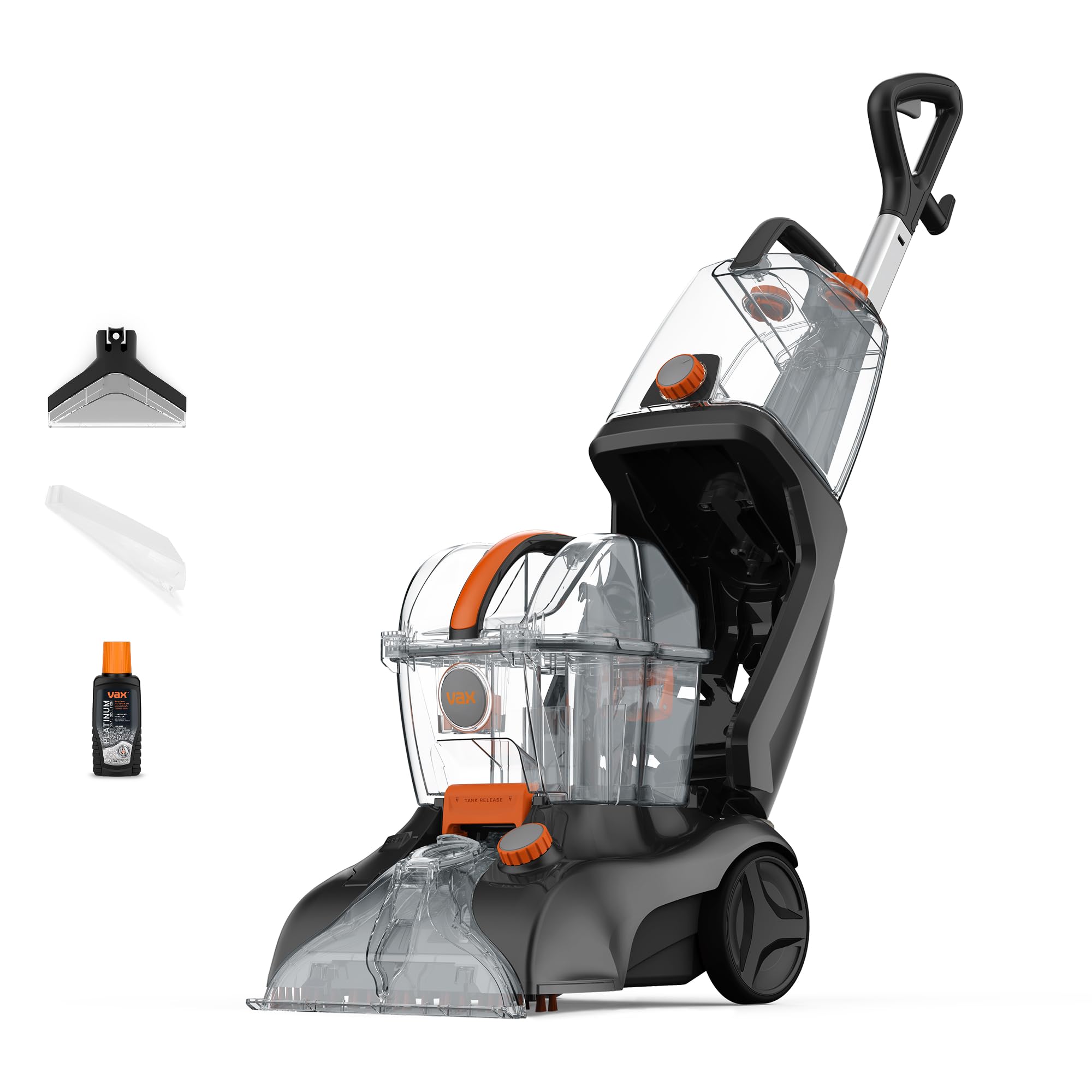 A Vax upright carpet washer cleaning a living room carpet